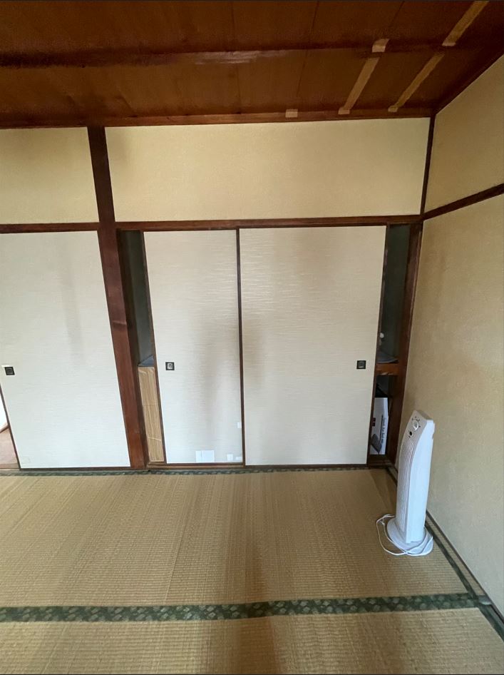 押入